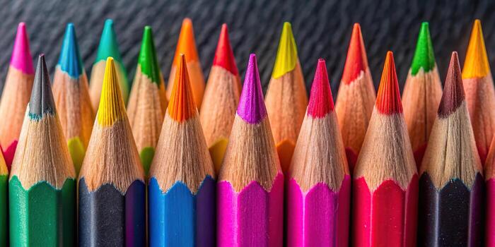 Closeup of a row of colored pencils photo