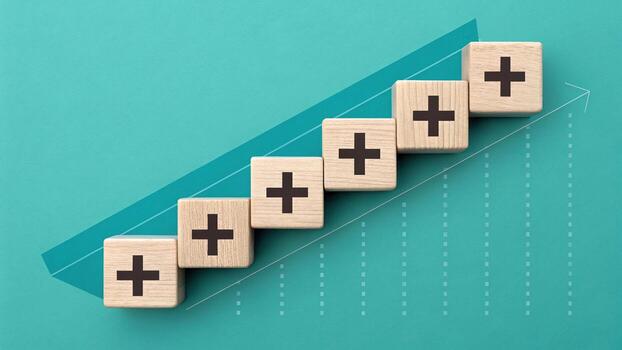 Wooden blocks with plus sign forming a graph photo