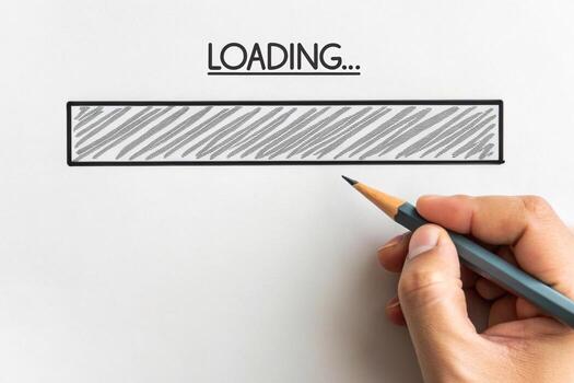 Hand drawing a loading bar with pencil photo