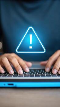 Warning sign on laptop keyboard, cybersecurity concept photo