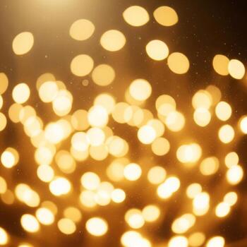 Abstract Golden Bokeh Light Festive Background with Sparkling Light Particles photo