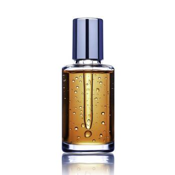 Elegant Glass Bottle of Fragrant Liquid with Reflections and Bubbles in Isolated White Background photo