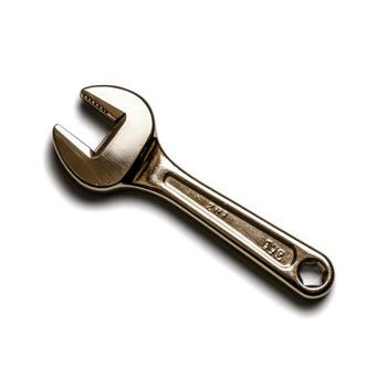 closeup of a Copper Colored Adjustable Wrench on a Plain Background for Hardware and Tools Illustrations photo