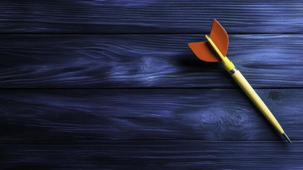 Wooden Arrow and Dart Tip on Rustic Blue Wooden Background for Creative Concepts photo