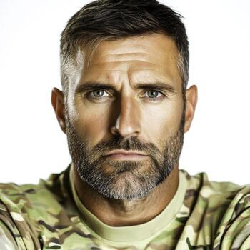 Serious Man in Military Camouflage Uniform Staring Intently at Camera with Determination photo