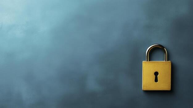 Yellow padlock on a vibrant turquoise background symbolizing security and protection concepts photo