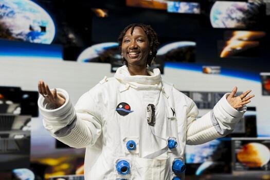 Cheerful astronaut analyzing Mars planetary data on displays in spacecraft powered by advanced engineering. Jolly starship cosmonaut exploring deep space, doing Martian surface research photo