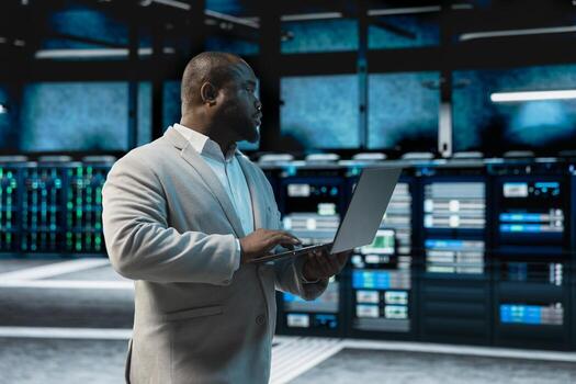 Data center admin running system diagnostic tests and error checking utilities to identify and resolve problems. IT expert looking for network issues affecting server performance and connectivity photo