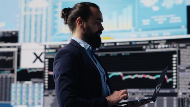 Surrounded by fintech data and forecasting models, skilled entrepreneur analyzing reports and insight to drive business growth. Company productivity and smart decision making. Camera A. photo