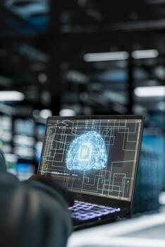 Close up of software developer programming in AI data center housing advanced equipment used for machine learning training. Server farm employee worker running artificial intelligence code photo