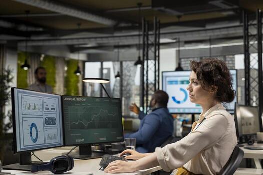 Professional analyst engaged in planning and analysis with computer results to create strategy reports for shareholders. Working on innovation, objectives alignment and growth. photo