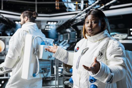 Astronaut doing briefing with Earth based scientists team while orbiting in space station. Starship crew member presents current mission status during remote videocall photo