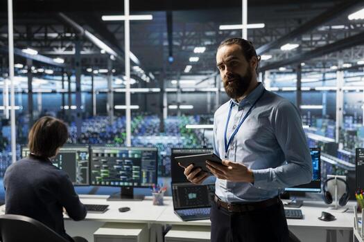 Businessman in data center presents machine learning tech to shareholders, demonstrating capabilities. IT professional briefing investors on server hub artificial intelligence hardware rigs photo