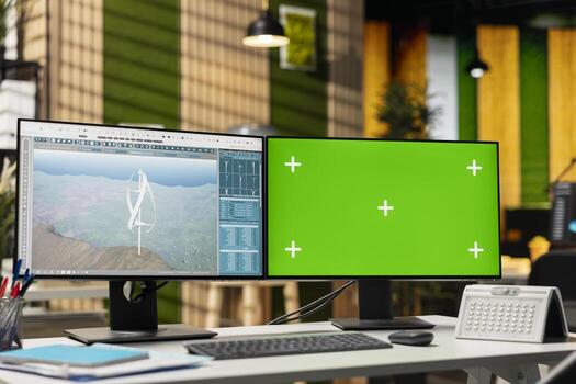 Advanced wind turbine models displayed on isolated screen PC in empty office. Innovative VAWT turbine in CAD software on chroma key computer in green tech company workplace photo