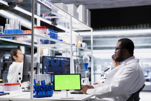 Mockup tablet app used by modern laboratory technician for DNA data analysis. Research facility professional using bioinformatics genomics software on isolated screen device photo