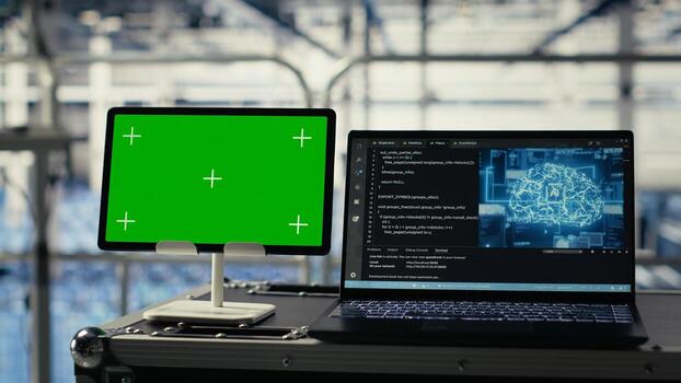Green screen tablet in server room with equipment rigs supporting AI technology. Chroma key device in data center storing and processing vast datasets for artificial intelligence operations photo