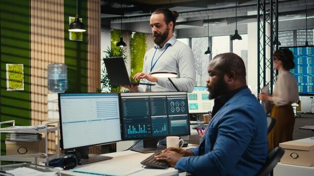 General manager uses digital technology to forecast business performance in a multinational company office, creating strategy reports leveraging data insights to optimize management. photo