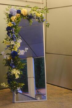 A mirror with flowers on it photo