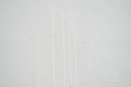 Textured Background of a White Wall with Subtle Drips, Splashes, and Vertical Lines Creating a Minimalistic and Clean Aesthetic for Various Designs photo
