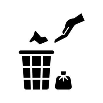 A solid-style icon showing a hand throwing waste into a bin, symbolizing proper disposal. vector