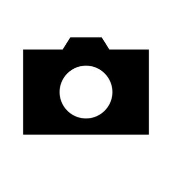 A simple filled icon of a digital photo camera device. vector