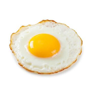 A fried egg isolated on white photo