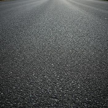 A plain asphalt road surface background photo