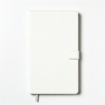 A plain white notebook isolated on white photo