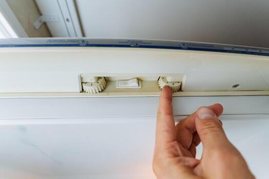 Adjusting a Sliding Door Lock Mechanism with a Convenient Finger Grip for Enhanced Security and Privacy in Residential Spaces, Ensuring Smooth Operation and Reliability in Daily Use photo