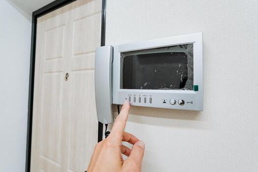 Introducing a cuttingedge intercom display with a sleek touch button for secure access to apartments, enhancing connectivity and safety for residents, ensuring their peace of mind photo