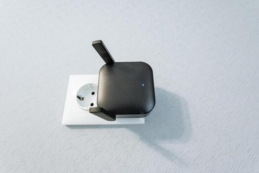 This Compact Wireless Range Extender is equipped with an advanced antenna, designed specifically to provide enhanced connectivity for your home or office network, ensuring robust signal strength photo