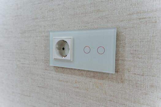 simple touch socket, modern wall socket with touch controls, sleek circular touch panel for modern interiors, minimalist glass wall socket featuring soft finish and led indicators photo