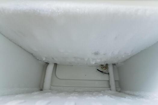 The Formation of Frost and the BuildUp of Ice Inside a Freezer Compartment Can Lead to Different Problems That Require Regular Attention and Maintenance to Ensure Optimal Functionality and Hygiene photo