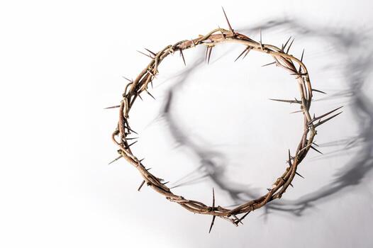Jesus Crown of thorns casting a distinct shadow for Christian background, Easter concept creating a symbolic image of suffering, sacrifice, and text remembrance Copy space photo
