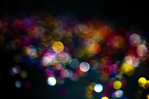 Close-up of sparkling bulb lights with soft-focus, creating a glittering background photo