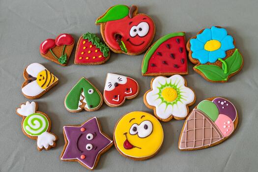 A delightful array of handmade ginger cookies arranged as a miniature, edible landscape. Features include icing details and creative shapes, bringing warmth and joy to any occasion. photo