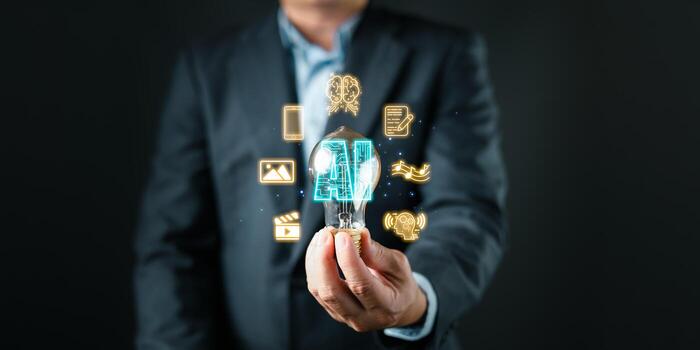 A professional holds a glowing lightbulb with an AI hologram surrounded by icons symbolizing content creation, use, research, and analysis, representing innovation and digital transformation. photo