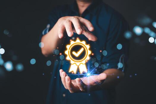 In a dark, futuristic setting, a businessman presents a glowing digital certificate icon with a checkmark and ribbon, symbolizing trust, certification, and quality assurance. photo