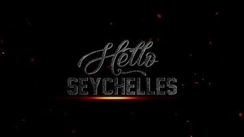 Olá seychelles uma dramático cinematográfico texto revelar com tremeluzente brasas, perfeito para viagem vlogs e destino promos video