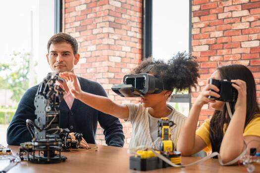 Teacher Supervising Students Using VR Headset and Robotic Kit in STEM Class, Children Engaging with Virtual Reality and Robotics, Diverse Students in a Technology and Engineering Workshop photo