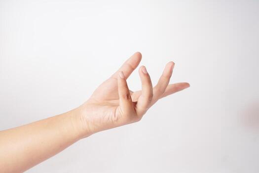 Hands held open with palms up are shown in front of a white background photo