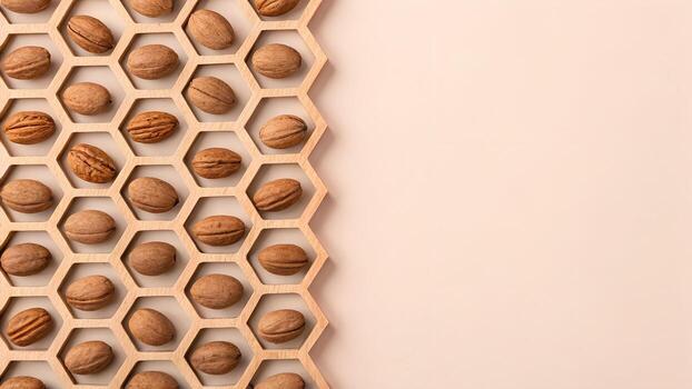 Whole Walnuts Arranged in a Hexagonal Pattern on a Textured Light Peach Background photo