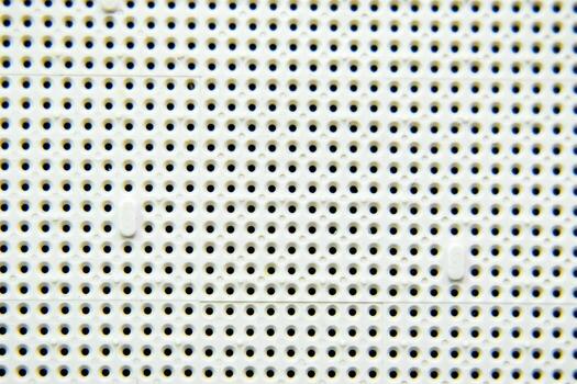 5A socket under the processor of th8e computer, holes under the feet of the contacts. Electronic board with electrical components. Electronics of computer equipment photo