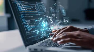 Developer Typing Code on Laptop with Futuristic Interface Display Technology video