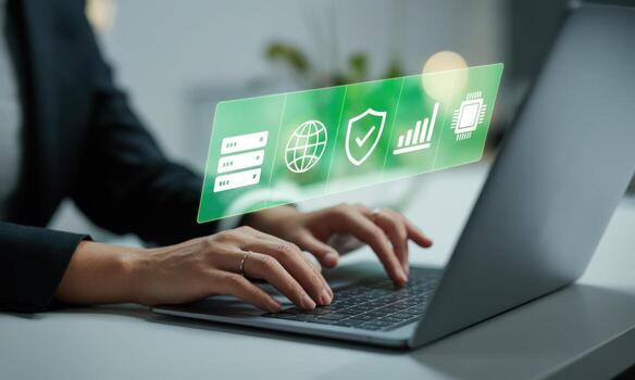 Professional woman typing on laptop with a futuristic holographic display of data, security, and network icons photo