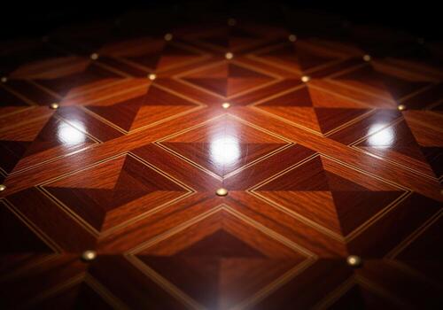 Luxurious polished mahogany wood surface with intricate geometric inlay pattern and brass studs photo