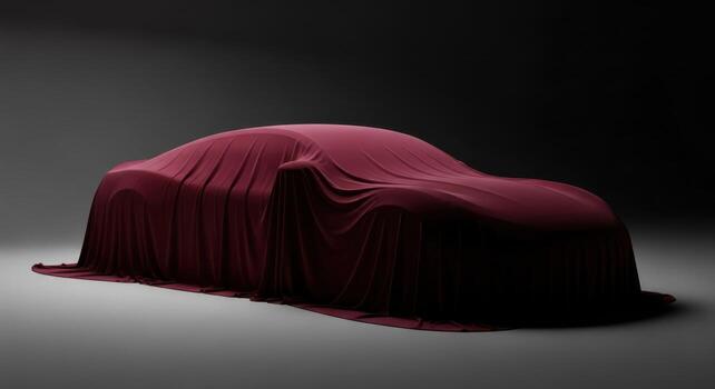 Luxurious red fabric drapes over a sleek, high performance car, hinting at a grand reveal photo