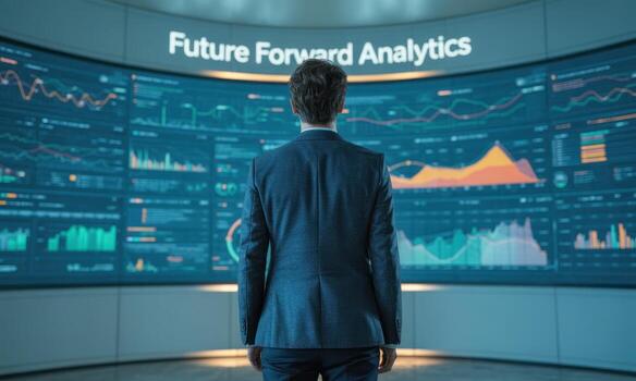 Businessman in suit analyzing future forward analytics on a large digital data wall photo