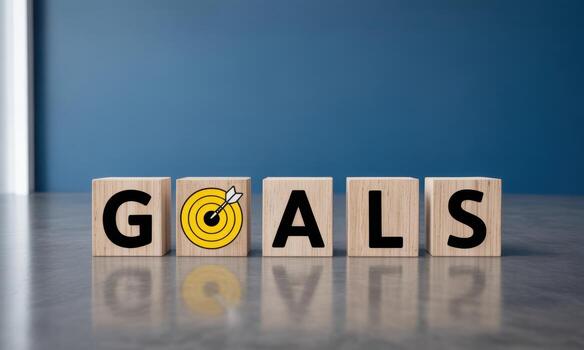 Business goals concept, wooden blocks with target icon and arrow for achievement photo