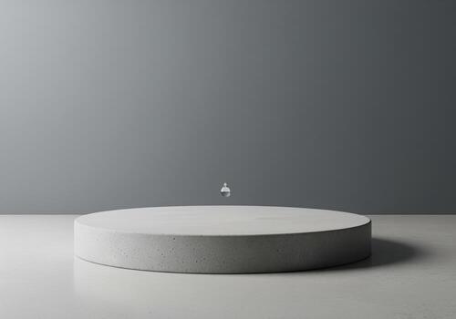 Minimalist concrete podium with a single water droplet in a clean grey studio setting photo